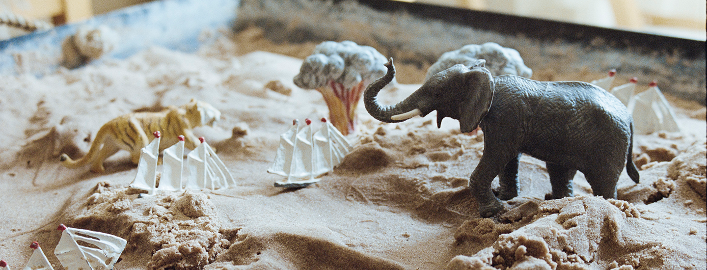 Leksaker i sandlåda